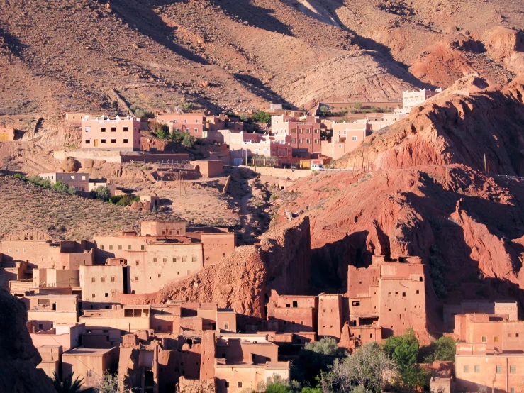 an old village sitting in the middle of a desert