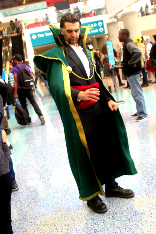 a man is dressed up as loki in the airport