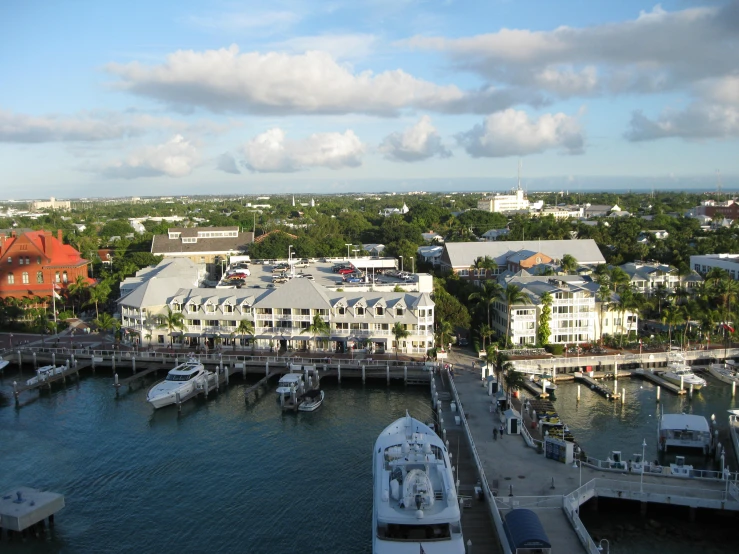 a marina is shown with houses on each side