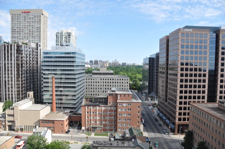 an aerial view of tall buildings in the city