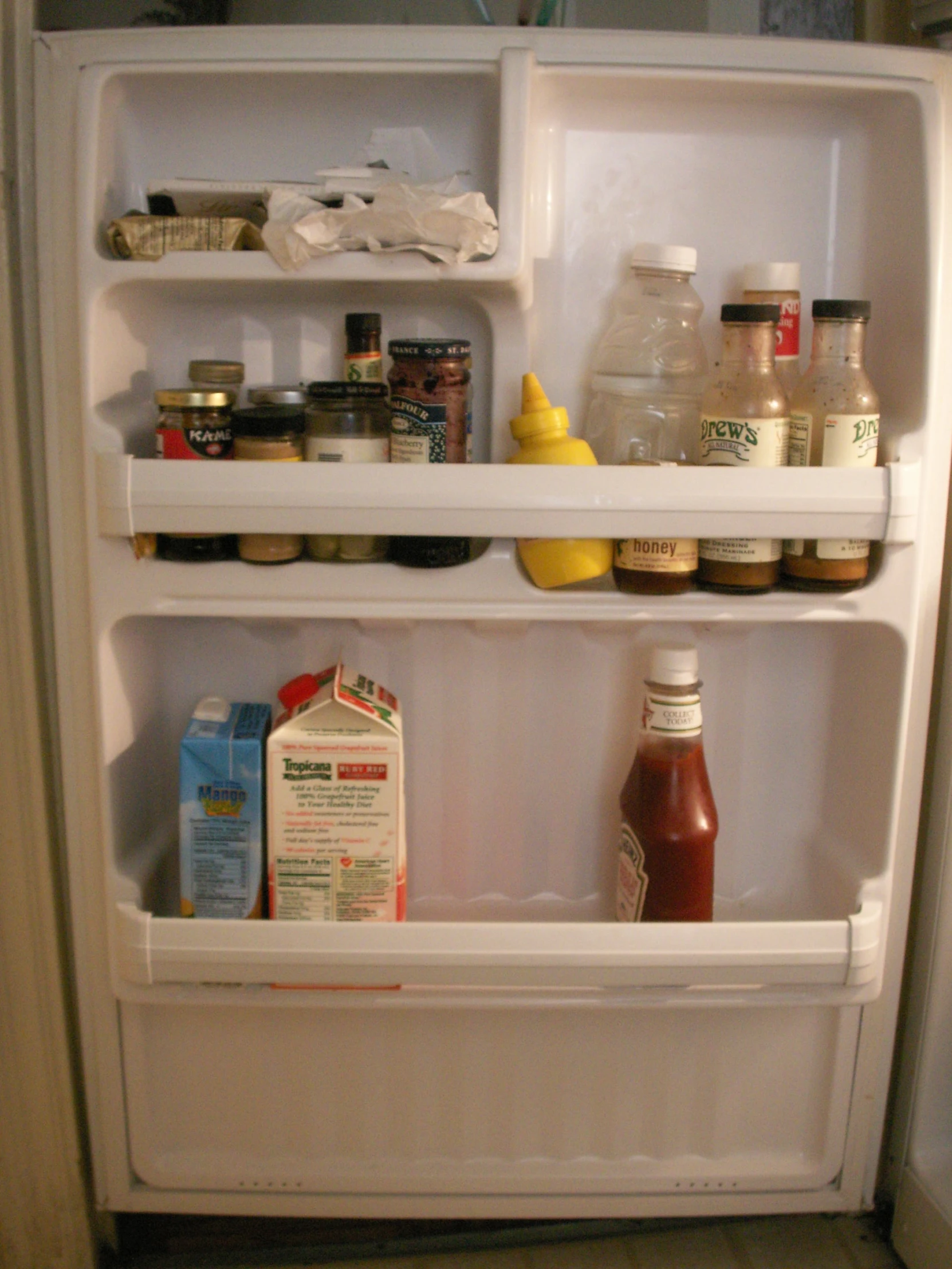 a refrigerator has food and drinks inside it