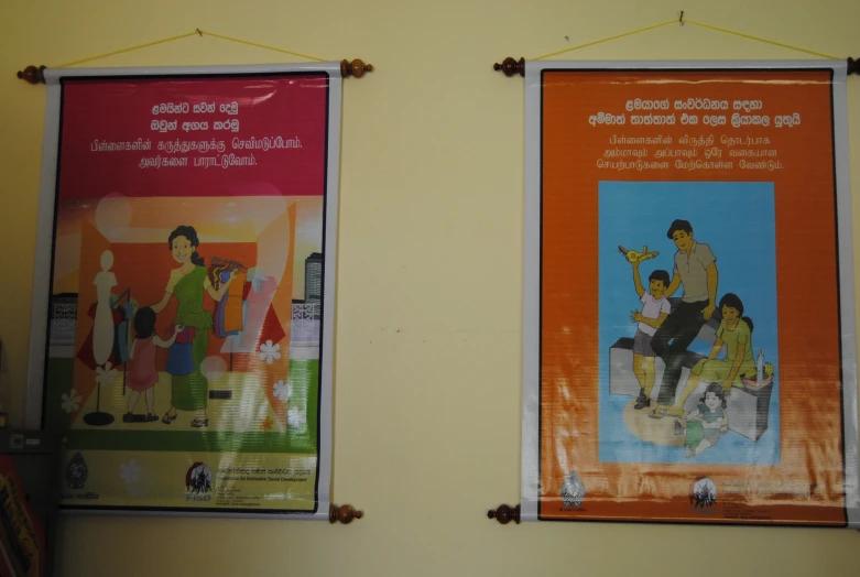 two posters on the wall displaying the different types of family life