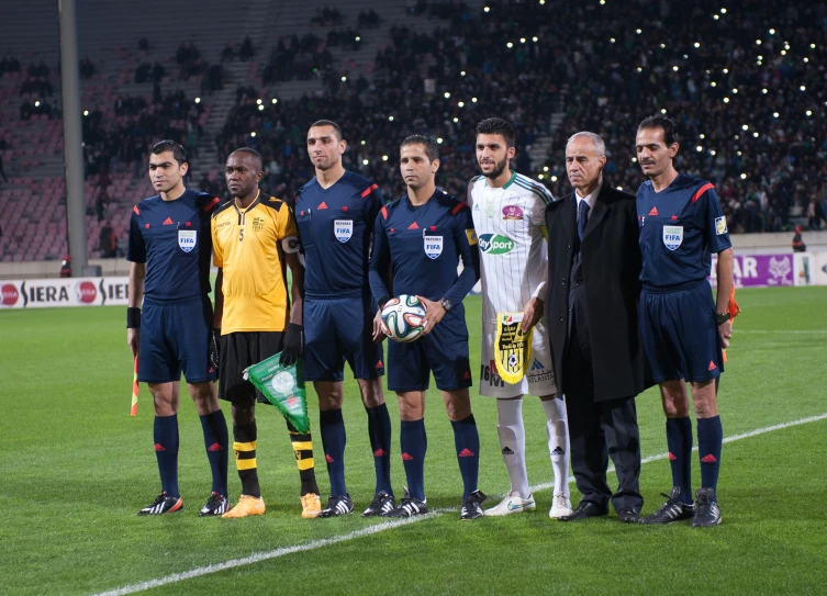 a soccer team is gathered for a team po