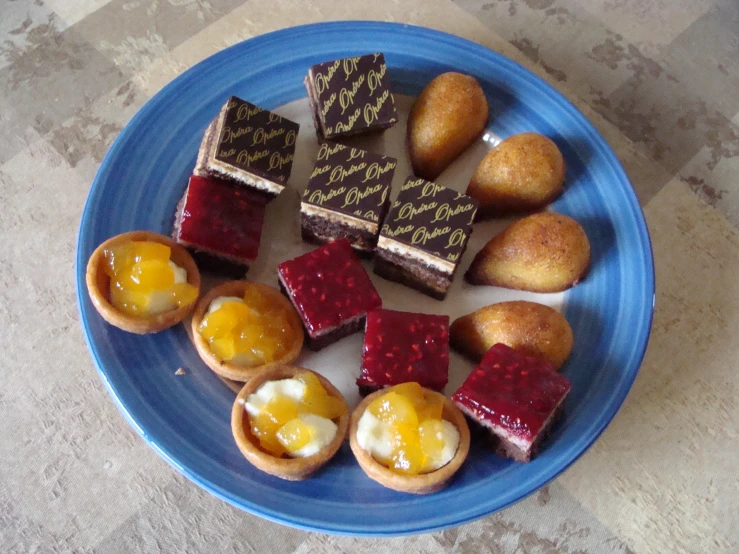 a plate with several different types of desserts