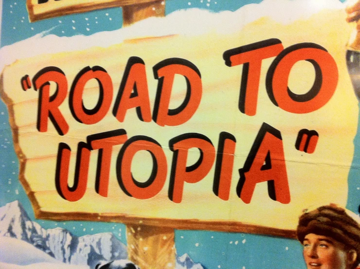 a sign that says road to utopia and a dog stands next to it