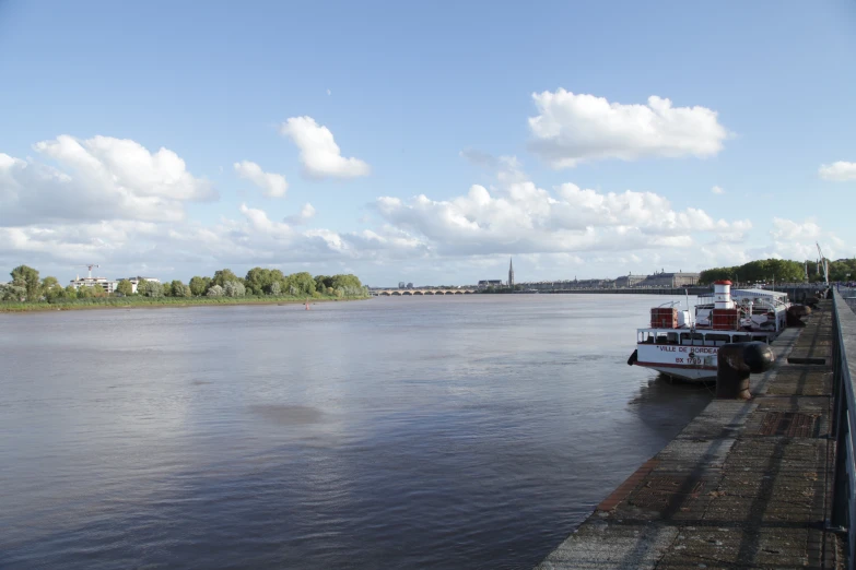 there is a boat on the water, docked