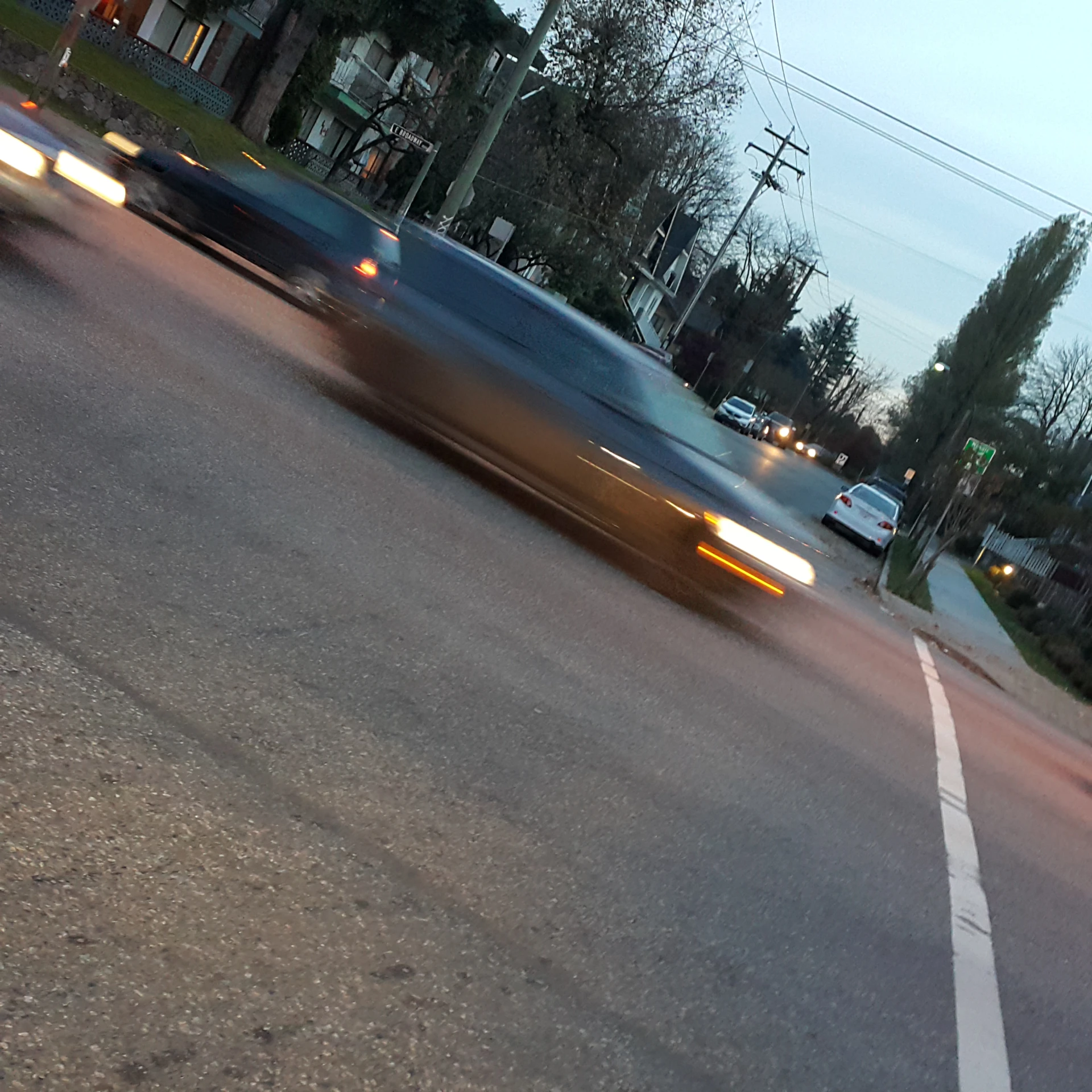 a blurry po of the car's lights on a street