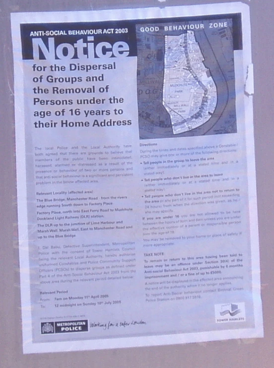 an image of a paper posted to a sign on a wall