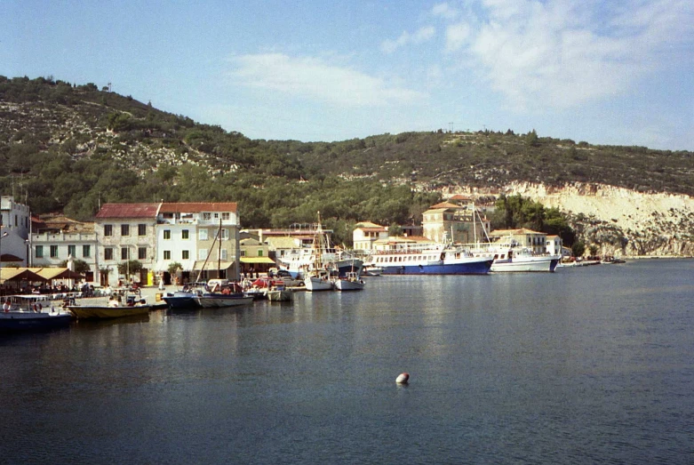 a marina with many boats and yachts near one another