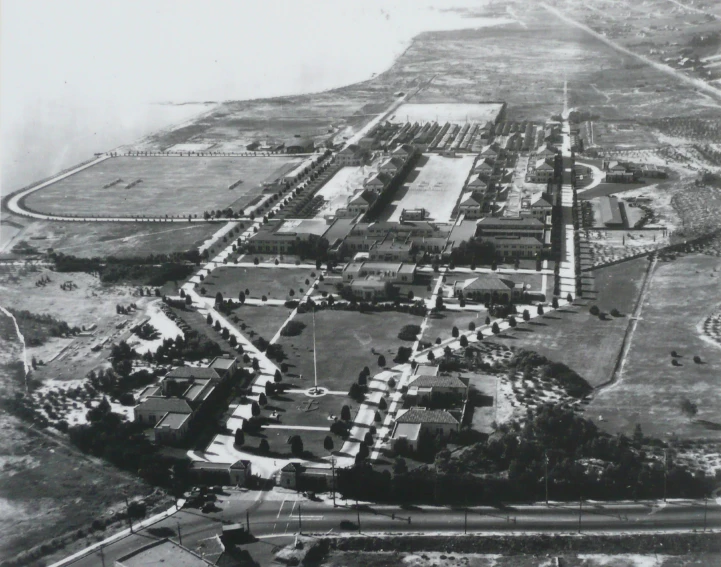 an aerial view of a town with several trees