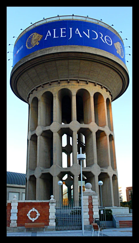 the very large water tower has been constructed to resemble a prison