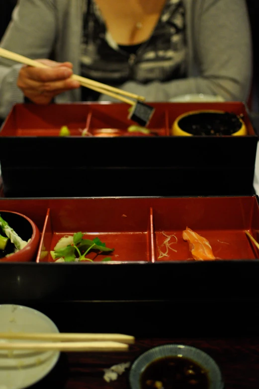 a couple of trays that have some food in them