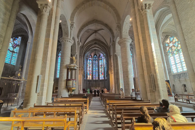 a large church with two rows of pews