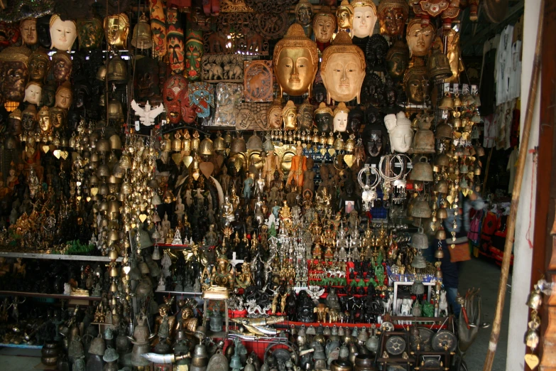 the store has various glass masks on display