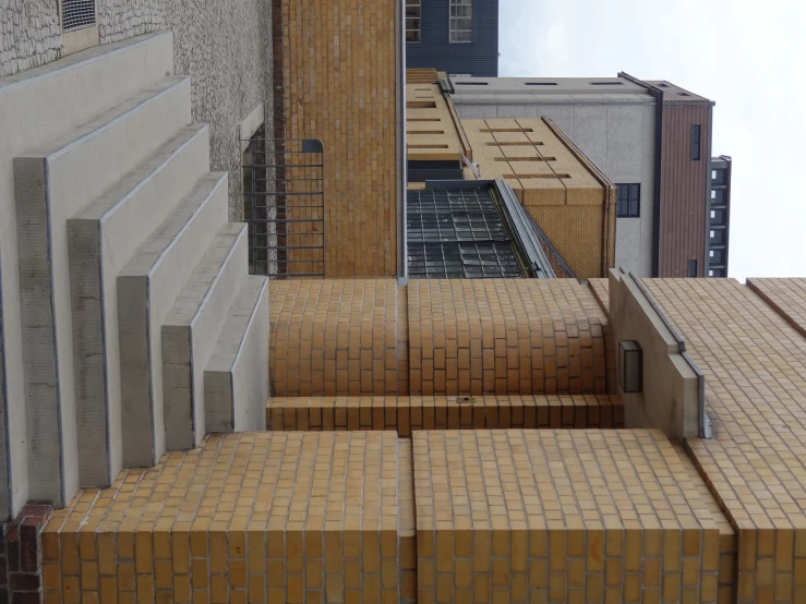 several stone steps leading to two buildings and one building