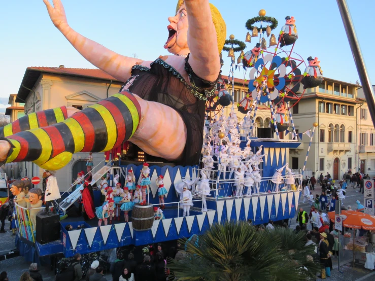 an upside down float depicting a large person with large socks and tights