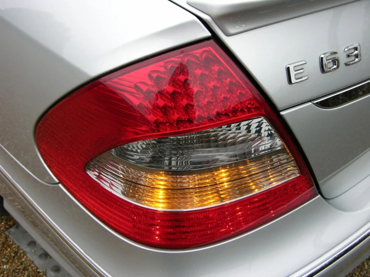 a car is shown with its tail lights on