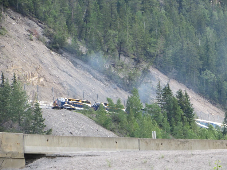 an overpass with a mountain range on the side of it