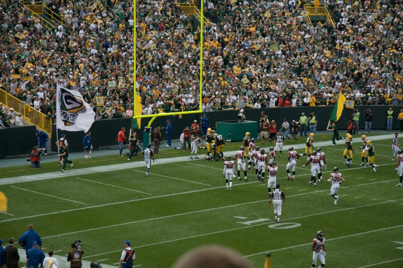 people in a stadium during a football game