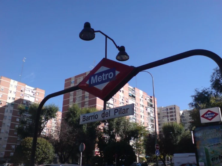 the street sign on the corner of metro