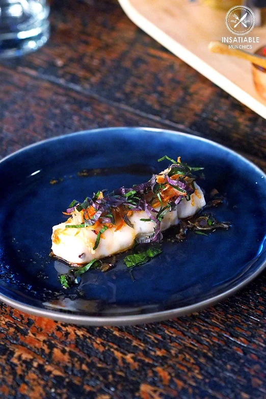 a blue plate on a table with food on it