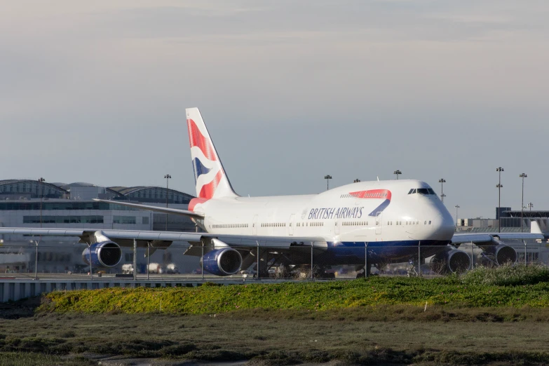 a large jumbo jet sitting at an airport