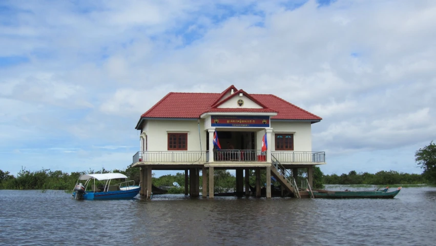 this house has two levels and an orange roof