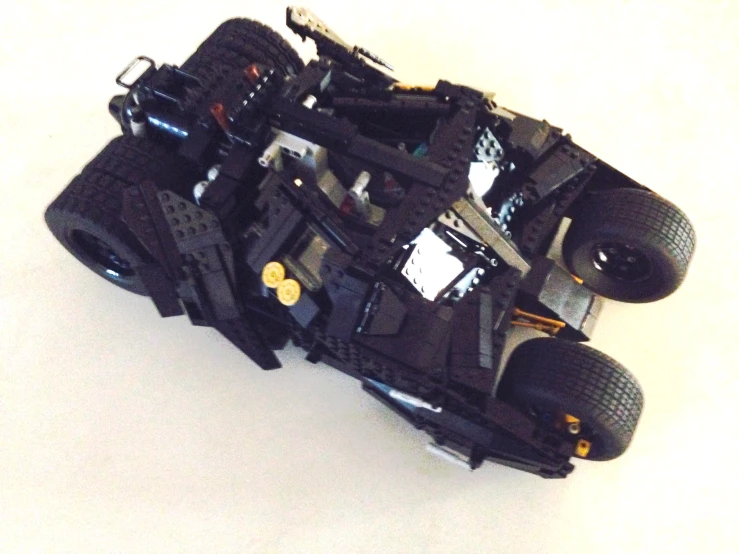 a batmobile made out of legos and black parts