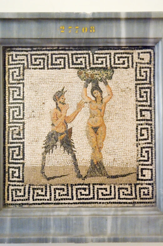 a mosaic shows the creation of two women in a scene