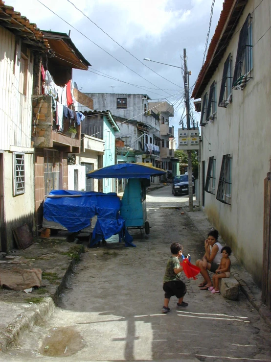 some s and some women near some houses