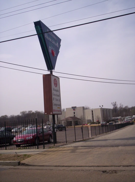 a street sign hanging off the side of a road