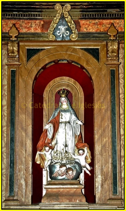 a very ornate statue in an old cathedral