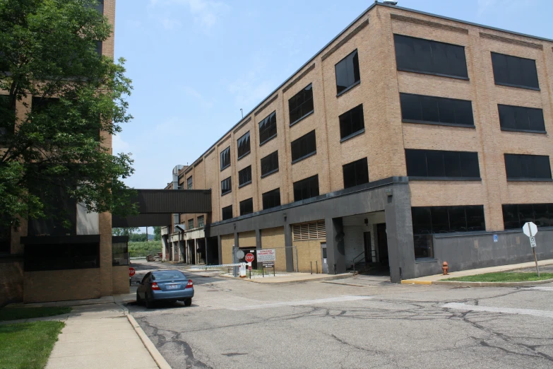 an empty parking lot of some sort in a city