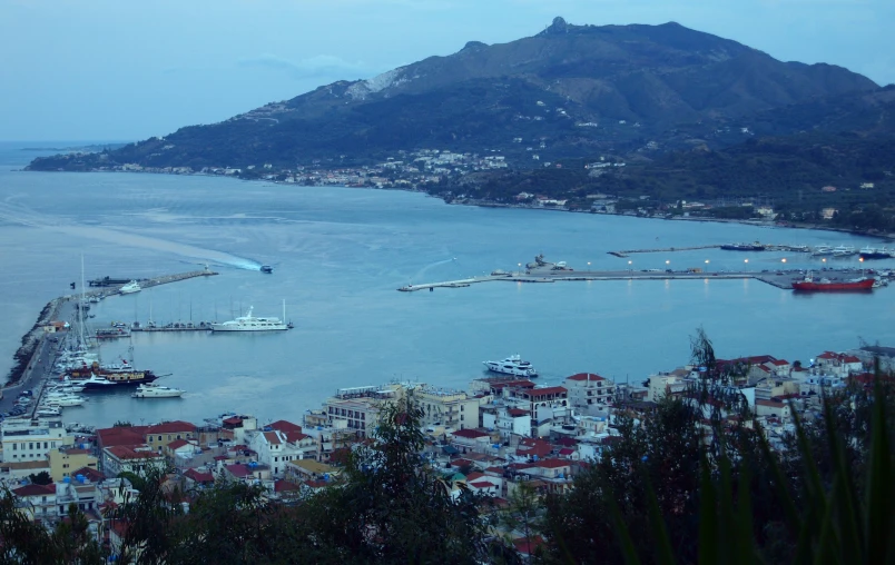 a marina on the coast line with boats