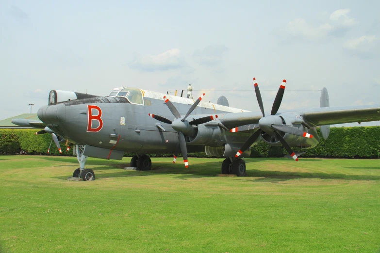 an airplane with its lights on is on display