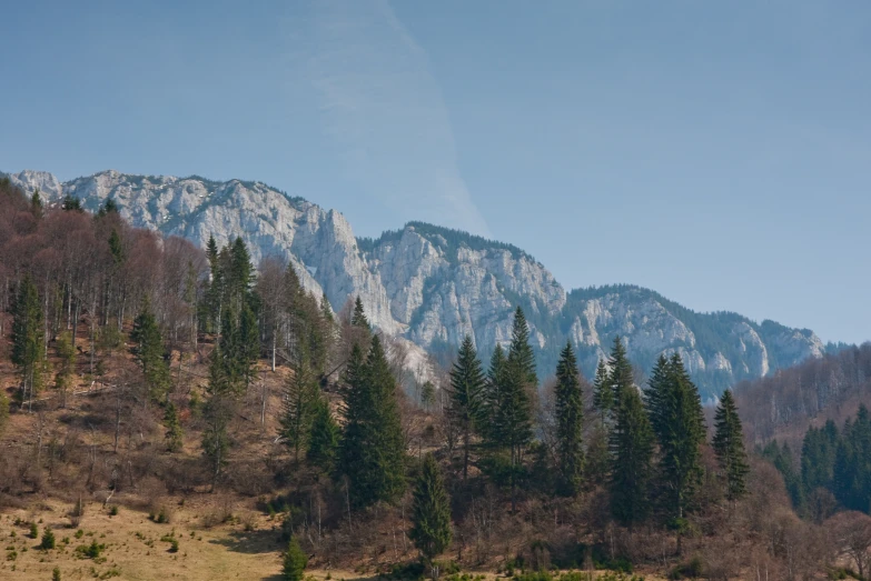 a couple of large mountains covered in snow