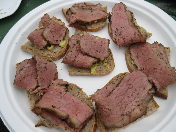 roast beef sandwiches on toast, ready to be eaten