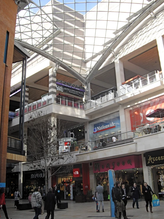 a building with a massive glass ceiling in it