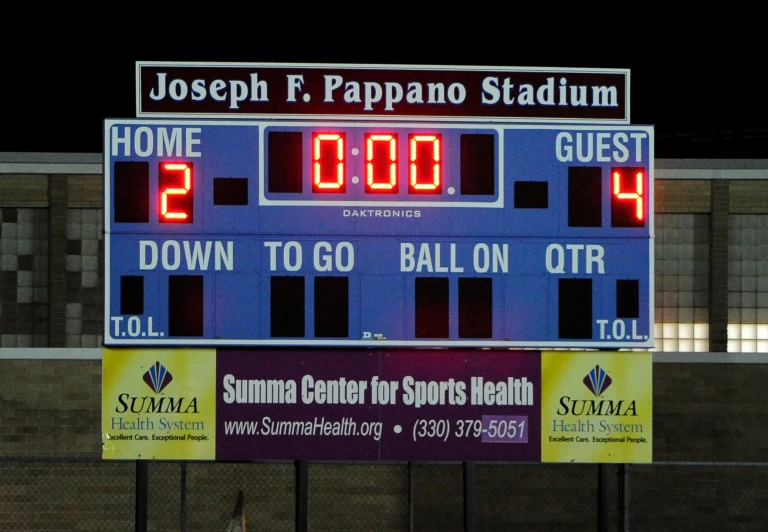 a scoreboard that has some lit up numbers