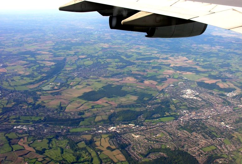 a view of a city taken from an airplane over an island