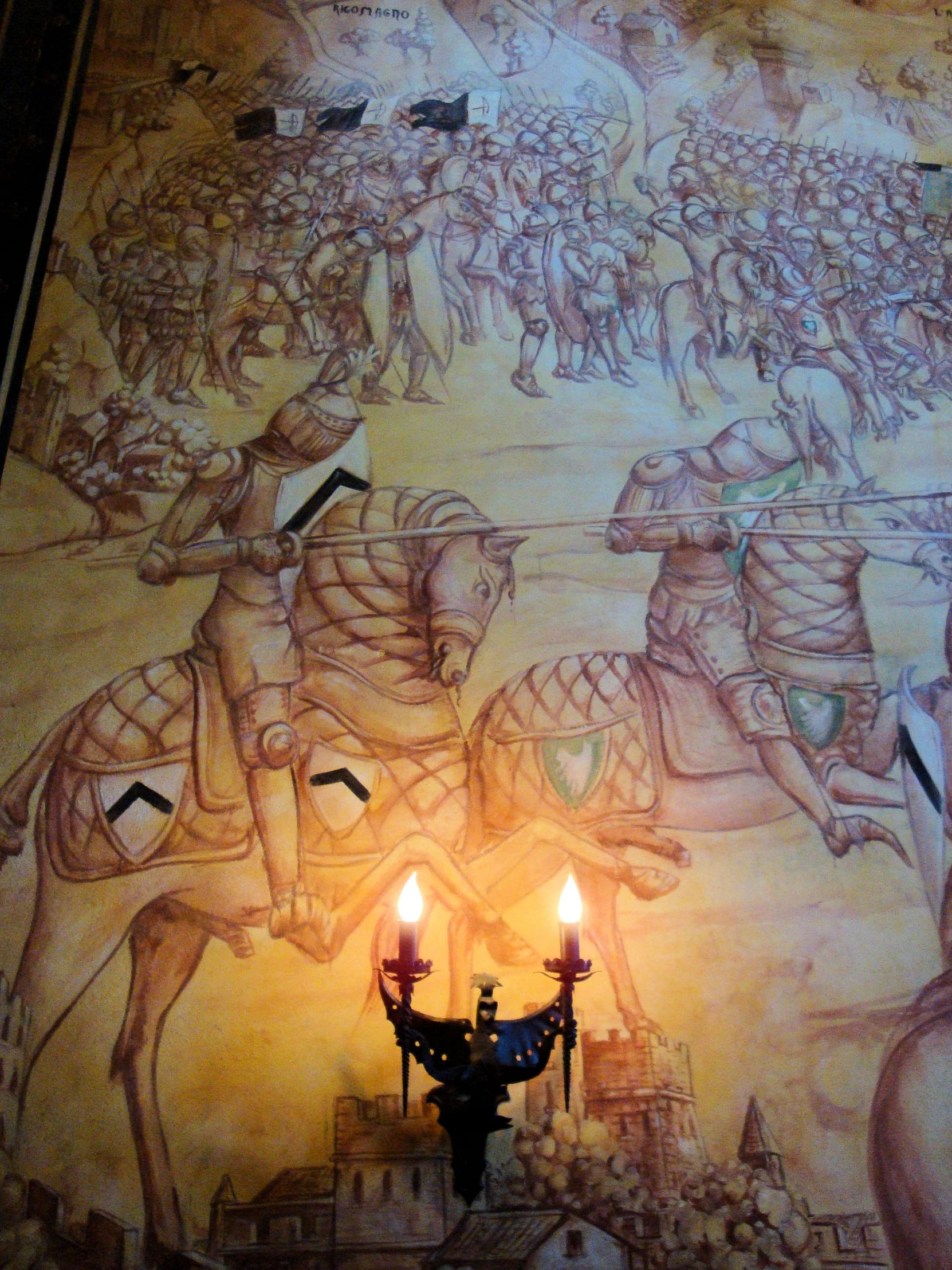 a painting with two lamps lit up
