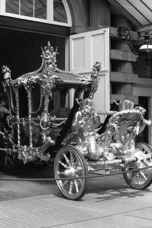 a vintage po of two elaborately decorated carriages