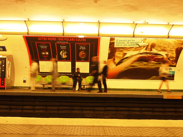 a train platform is being held up by people