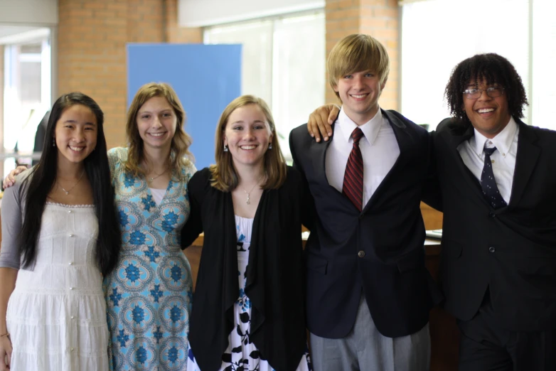 a group of people pose for a picture