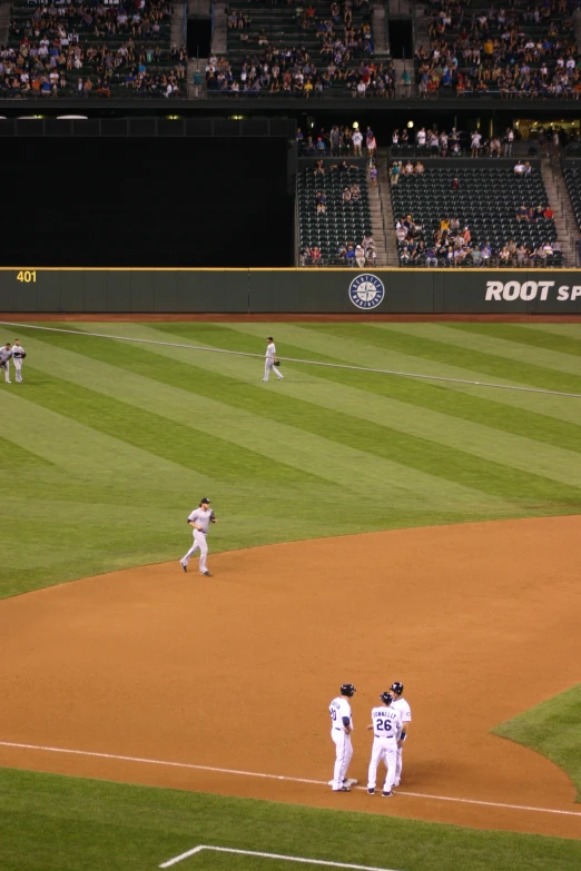 a baseball game being played on a professional field