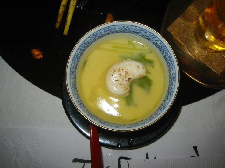 a small bowl of food on a table