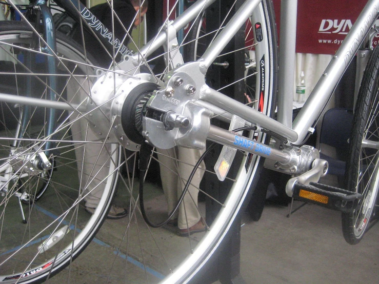 the front wheel of a bike is visible through a magnifying glass window