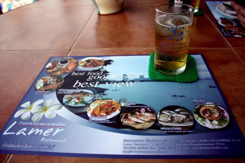 the table is full of drinks and food on display