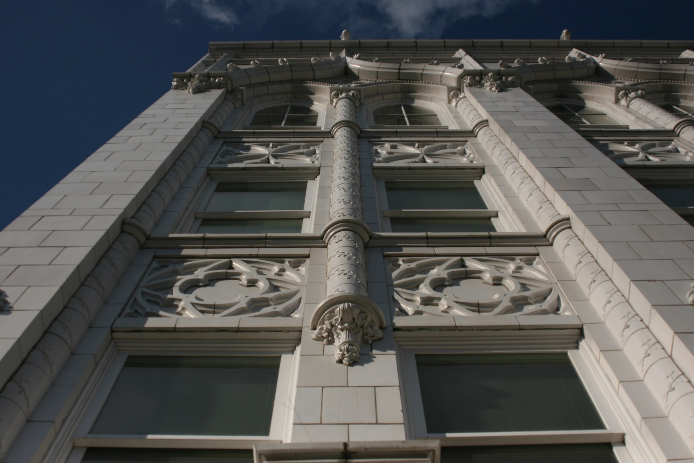 an ornate building with a face carved out