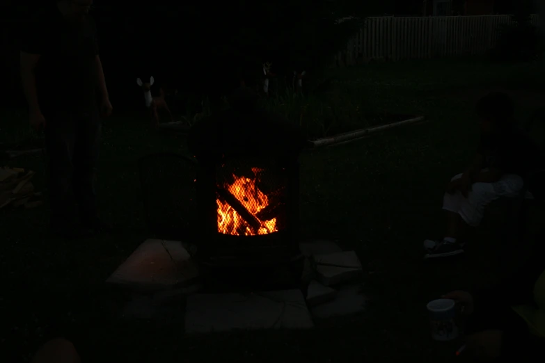 an image of a burning fire in the dark